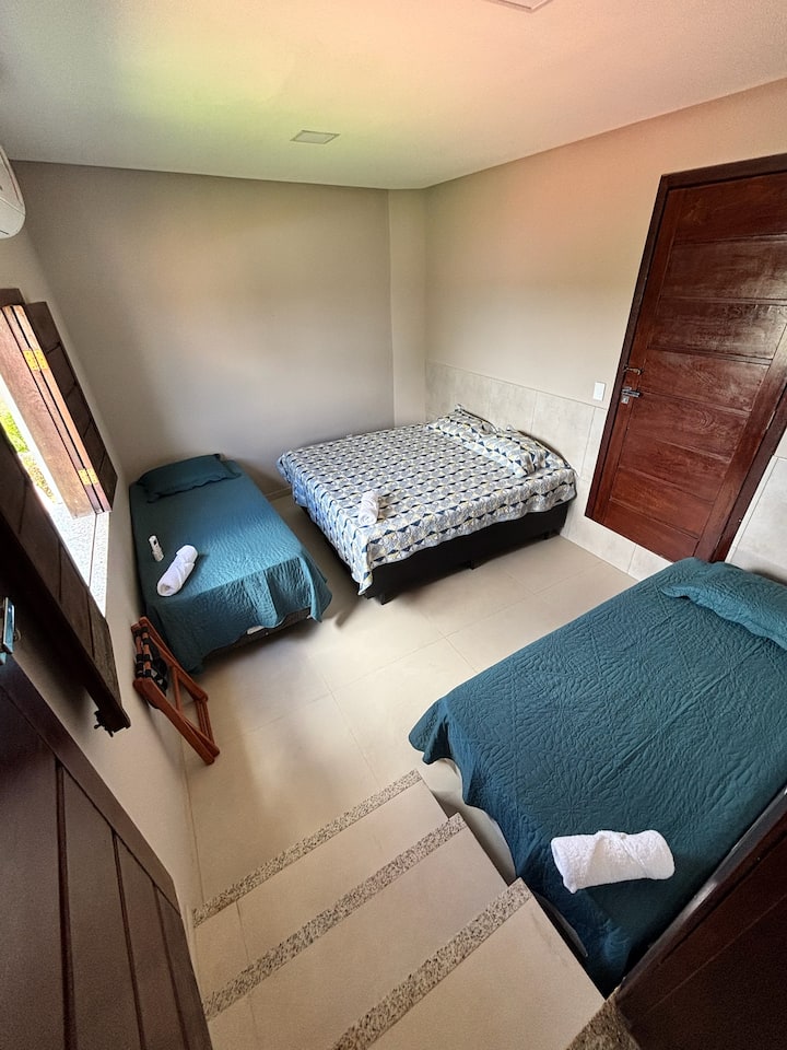 Quarto com camas de solteiro